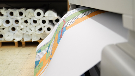 Jerusalem, Israel - May 21, 2017: Wide format printer is printing color design draft outline sketch...