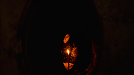 Jerusalem, Israel - May 25, 2017: People in the Jesus Empty tomb in Jerusalem in the Holy Sepulcher Church. View through window. The Church and Empty Tomb the most sacred places for all Christians.のeditorial素材