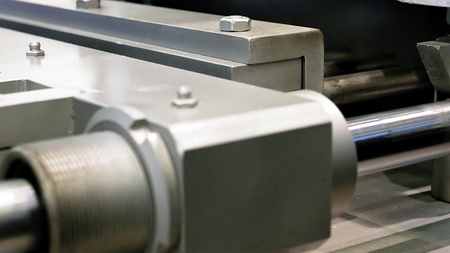 Crank drive gear of industrial factory machine. Automated robotic production machinery.