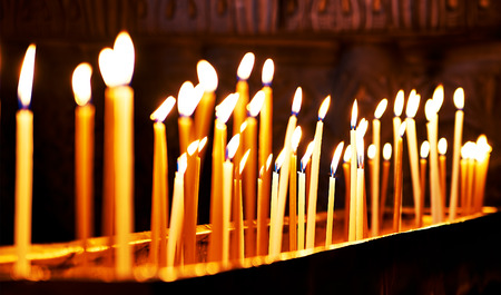 Burning candles. Celebration event or religious memorial attribute of warmth and sincerity.