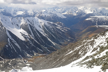 Beautiful panorama of South and North Chuya Mountain Range from slope of Metallurg Peak. Altai Republic, Russiaの写真素材