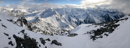 Beautiful panorama of South and North Chuya Mountain Range from slope of Metallurg Peak. Altai...