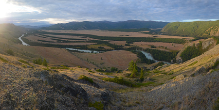 Beautiful sunset above Argut River Valley, Altai Republic, Russiaの写真素材
