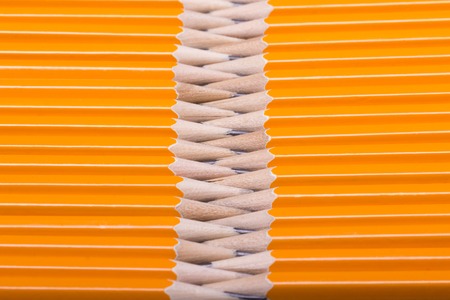 a lot of sharpened yellow wooden pencilsの写真素材