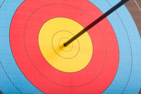 Arrow hit goal ring in archery target isolated