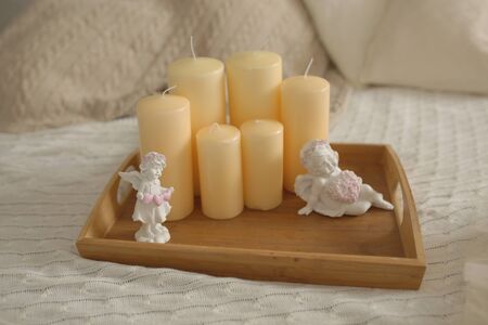 White angel statue. A statuette with a heart.の写真素材