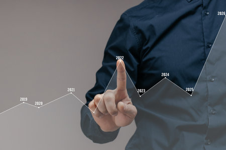 businessman analyzes and plans the schedule of profit and increase of positive indicators of the company. Development of growth success in the concept from 2019, 2022.の写真素材