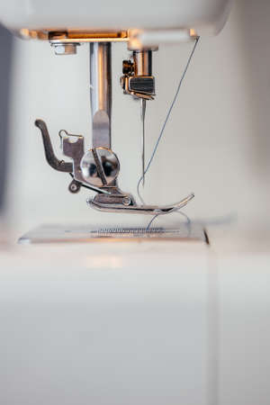 Close-up of the sewing machine and sewing needle studio. macroの写真素材