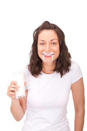 Young lady was taking too much yogurt and now she looks like vampire. の写真素材