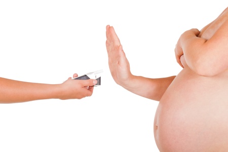 Pregnant woman rejects of taking cigarette.の写真素材