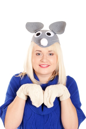 Portrait of beautiful women in blue sweater and white mitten wearing mouse mask on isolated white backgroundの写真素材