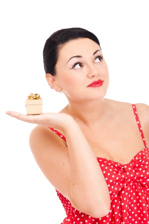 Young woman in ladybug-like dress and small boxed presentの写真素材