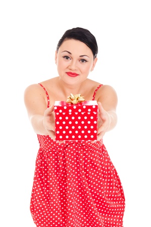 Young woman in ladybug-like dress and boxed presentの写真素材