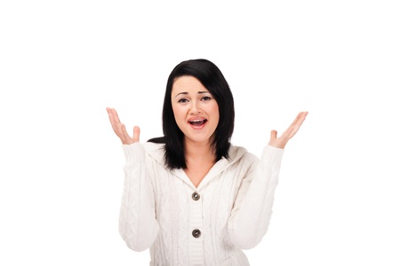 Young woman in white knitted dressing gown on isolated white backgroundの写真素材