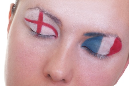 Young girl is dreaming about score in match between England and France: EURO 2012, group D, 11th of June. Focus on eyelashes.の写真素材