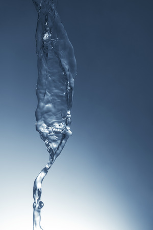 Speed photo of blue water falling from the topの写真素材