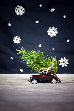 Machine carries a Christmas tree fromの写真素材