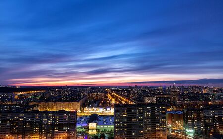 Dawn clouds over the metropolis of early winter night 2の写真素材