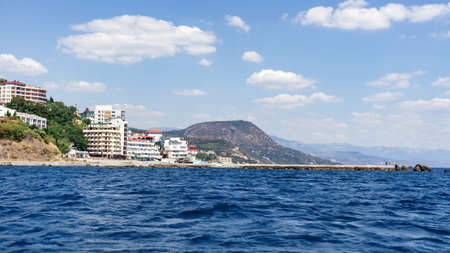 Village cliff view from the sea to the tourist center and resting placeの写真素材