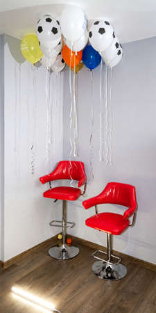 two red bar stools in the Studio with gray walls against the background 2の写真素材