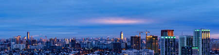 Night houses with a gleam of sunset in the city center 4