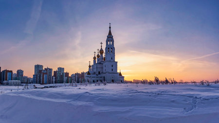 Church of the saints and Gods builders at sunrise against the backdrop of a clear sky and withered grass 5の写真素材