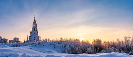 Church of the saints and Gods builders at sunrise against the backdrop of a clear sky and withered grass 7の写真素材