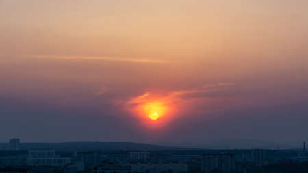 Sunset over the hills in clear weather gorizonの写真素材