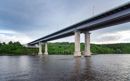 View from the Volga River to the Zaymishchensky Bridge in Kazan with a chapelの写真素材