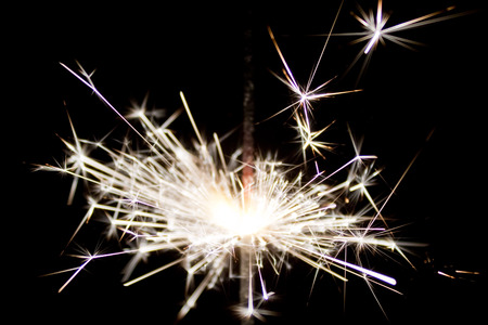 sparks sparklers in the dark closeupの写真素材