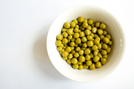 canned peas on white backgroundの写真素材