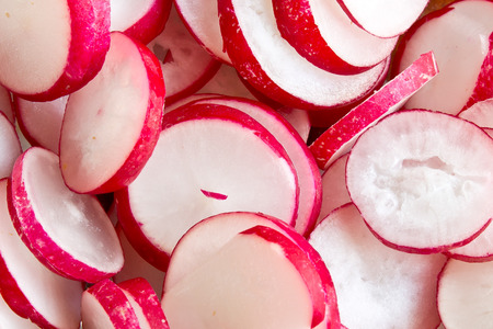 sliced red radishesの写真素材
