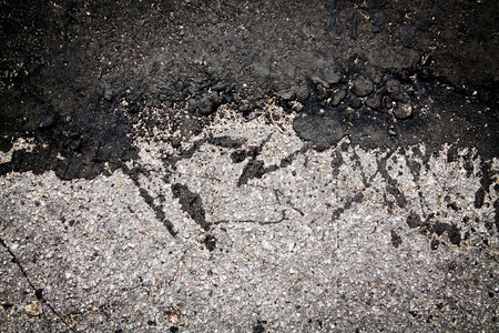 old and refurbished asphaltの写真素材