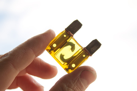 car fuse in handの写真素材
