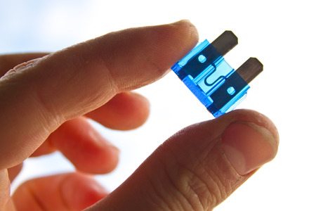 car fuse in handの写真素材
