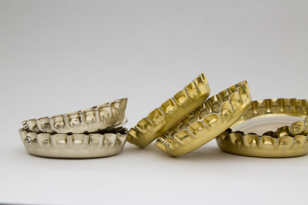 bottle caps on gray backgroundの写真素材