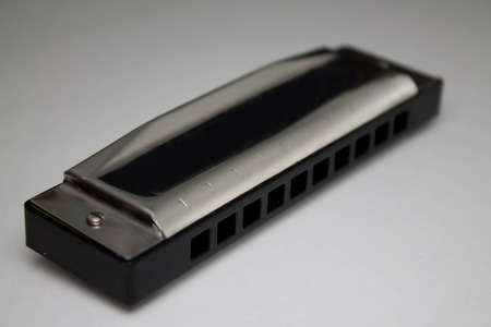 mouth organ on white backgroundの写真素材