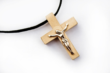 wooden cross with jesus on white backgroundの写真素材