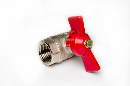 water metal valve with a red handleの写真素材