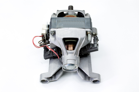 electric motor from a washing machine isolated on white backgroundの写真素材