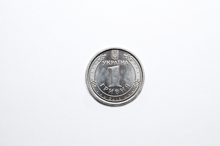 new ukrainian grivna coin isolated on whiteの写真素材