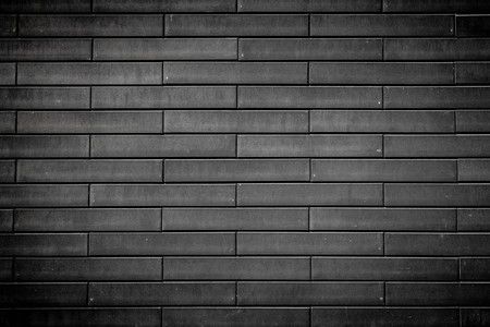 black brick wall backgroundの写真素材