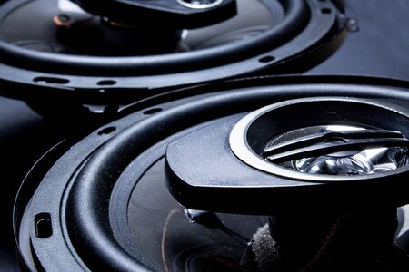 Modern car speakers close-up on a dark backgroundの写真素材
