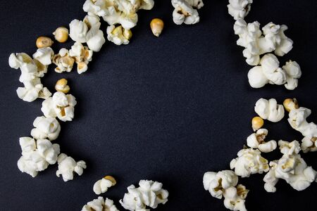 Ready popcorn on a dark backgroundの写真素材