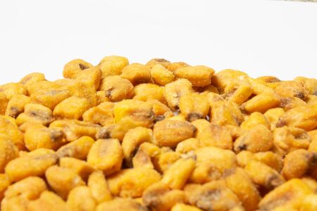 Roasted corn nuts on white background