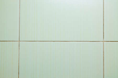 Green tiled floor clean condition with grid lines for backgroundの写真素材