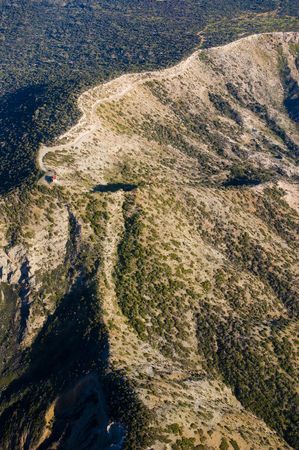 Single house on a top of mountain, aerial viewの写真素材