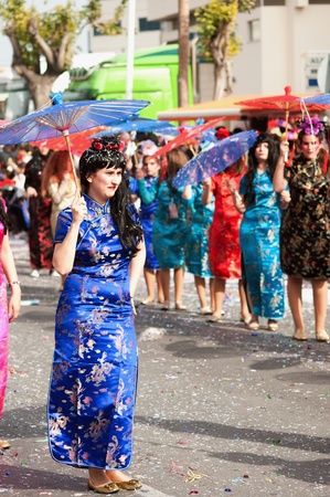 LIMASSOL, CYPRUS - MARCH 6: Participant from Chinese Theme Group during the Carnival Parade on March 6, 2011 in Limassol, Cyprus.のeditorial素材