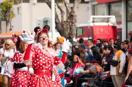 LIMASSOL, CYPRUS - MARCH 6: Woman dressed as a cartoon mouse at Carnival Parade on March 6, 2011 in Limassol, Cyprus.のeditorial素材