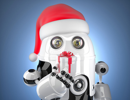 Cute robot with santa's hat holding gift box. Technology concept. Contains clipping pathの写真素材